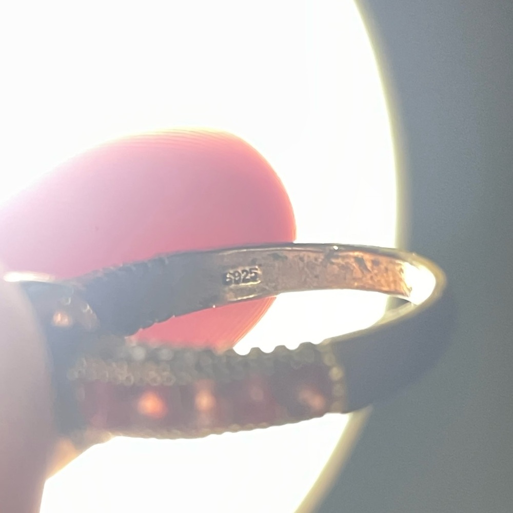 gold-plated sterling silver ring featuring a prominent red diamond(stamped)